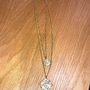 LUVAJ gold necklace with evil eye and sun